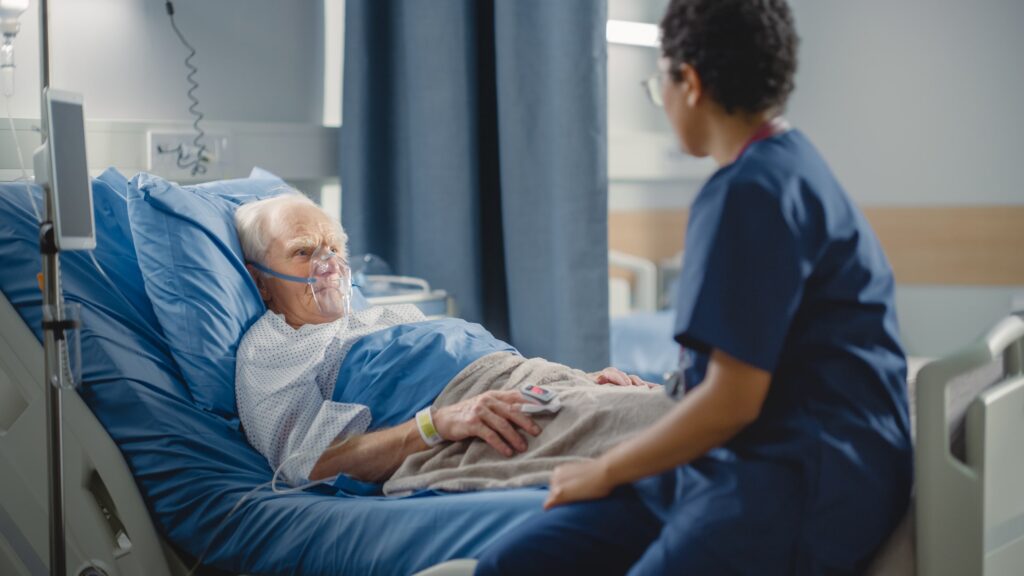 Man in Hospital Bed